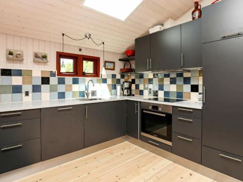 Three-bedroom Holiday Home In �lb�k 1