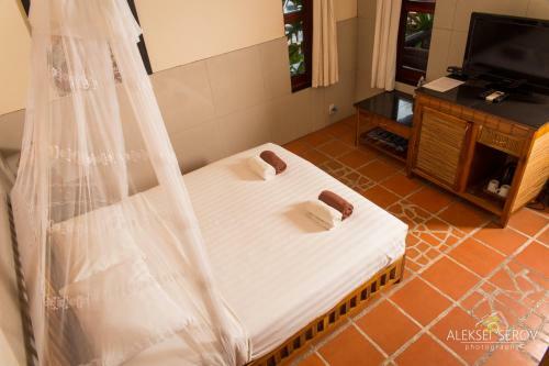 Hotel Joe's Cafe & Garden Resort