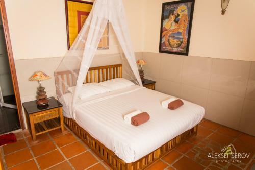 Hotel Joe's Cafe & Garden Resort