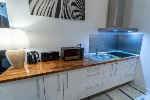 Apartamentos La Casa Rosada