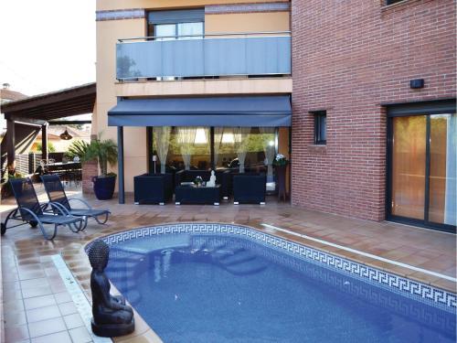 Four-bedroom Holiday Home In Lloret De Mar