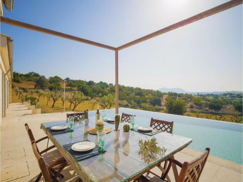 Four-bedroom Holiday Home In Moscari