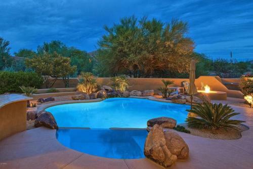 Oasis In The Desert Near Boulders