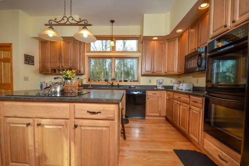 Wispering Woods Four-bedroom Holiday Home