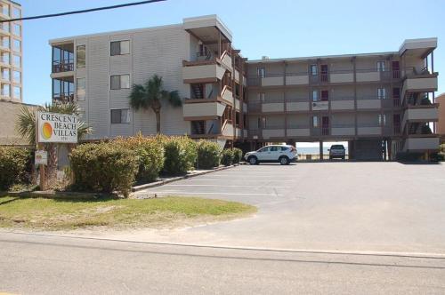 Apartamento 1068-103 Crescent Beach Villas Condo