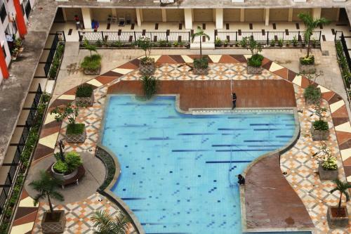 Pool View 2br Kemang View Apartment By Travelio