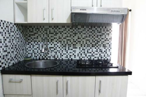 Pool View 2br Kemang View Apartment By Travelio