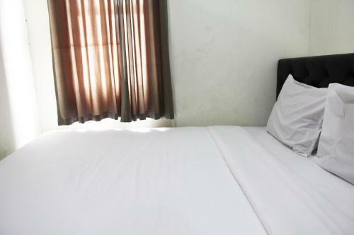 Pool View 2br Kemang View Apartment By Travelio