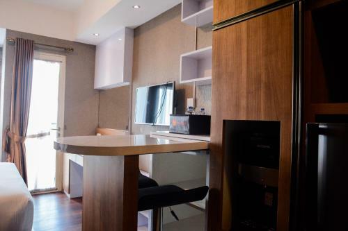 Comfortable Studio The Oasis Lippo Cikarang Apartment By Travelio