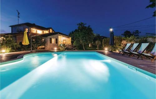 Four-bedroom Holiday Home In Marcana