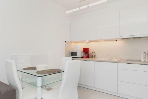 Apartamenty Laguna Kwarta? R�?y Wiatr�w