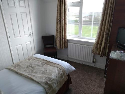 Hostal Palm Court