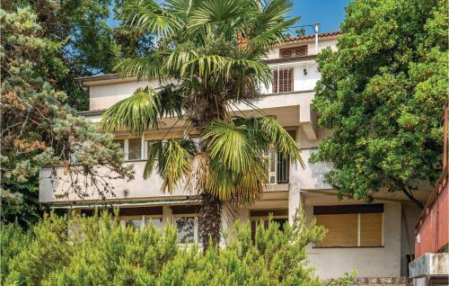 Four-bedroom Holiday Home In Volosko