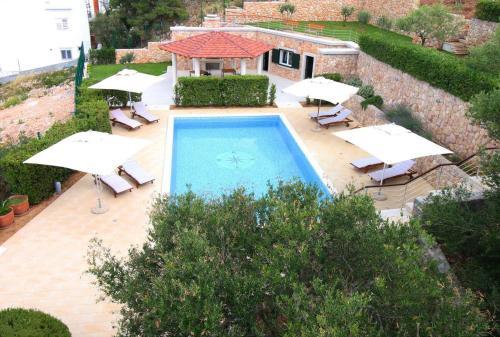 Apartments With A Swimming Pool Primosten - 16311