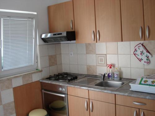 Apartments With A Parking Space Banjol (rab) - 14134