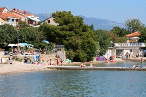 Apartments With A Parking Space Banjol (rab) - 11082
