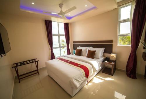 Hostal The White Harp Beach Hotel