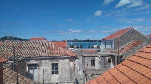 Apartments By The Sea Murter - 12716