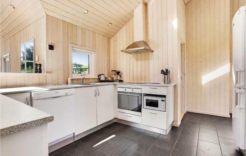 Four-bedroom Holiday Home In Lokken