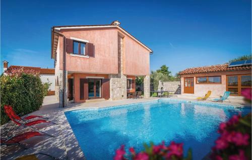 Four-bedroom Holiday Home In Orihi