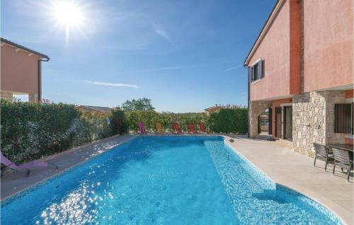 Four-bedroom Holiday Home In Orihi