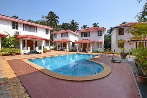 Apartamento Cosy Poolside Villa In Vagator, Goa