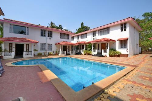 Apartamento Cosy Poolside Villa In Vagator, Goa