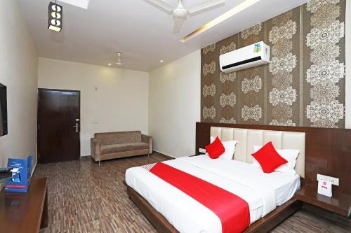 Capital O 2855 Hotel Sanskriti Greens