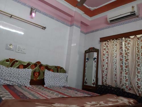 Hotel Goroomgo Sureswory Pampa Puri
