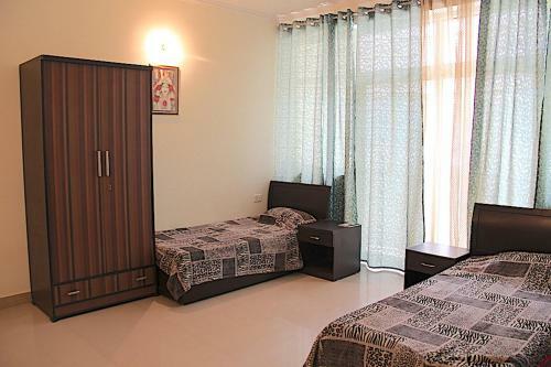 Apartamento Sri Vrindavan Dham