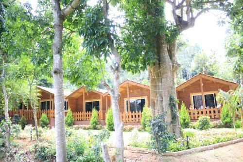 Oyo 26892 Coorg Amodhini Wood Cottage Suits