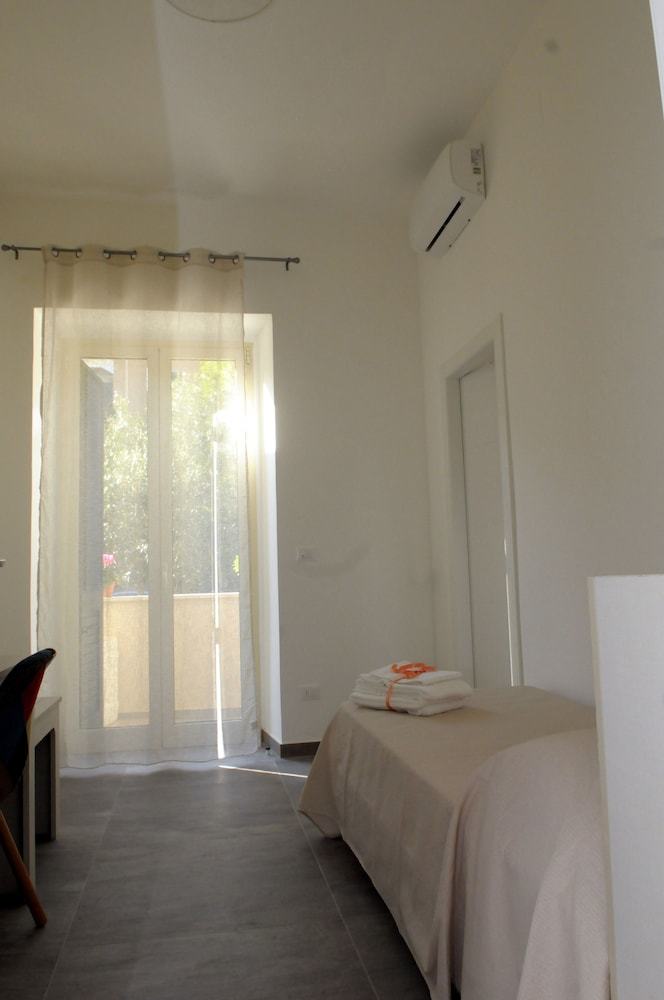 Hostal Della Torre Rooms