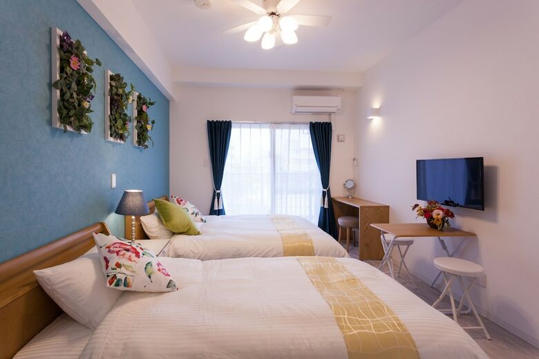 Aparthotel Kariyushi Condominium Resort Chatan Araha Sunset
