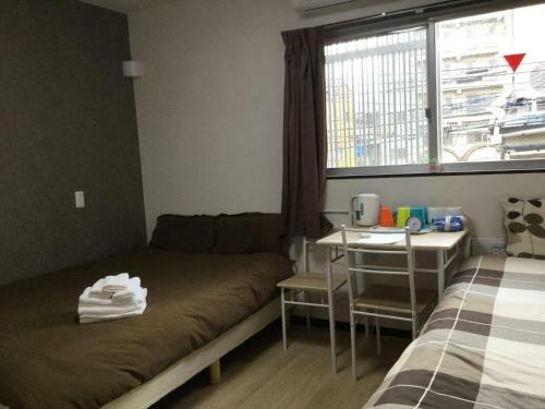 Apartamentos Keimei Guest House Rm 202