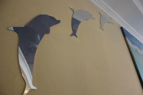 Three Dolphins Hotel