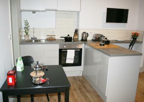 Apartamento Charming Executive Studios