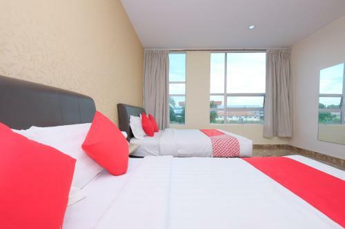 Hostal Oyo 89493 Q Hotel