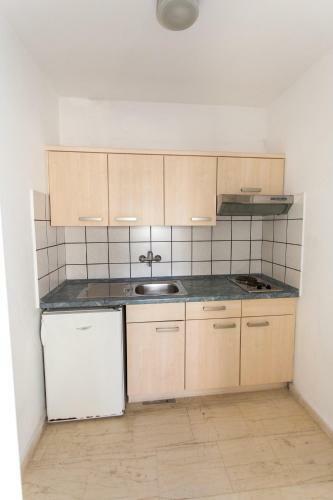 Apartamento Sigma Hotel