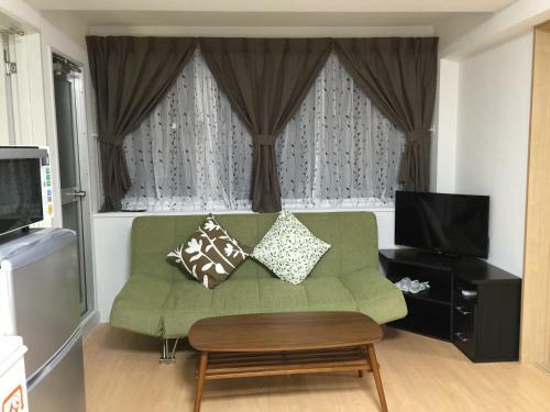 Apartamento Issyuku Hostel