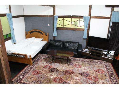 Hostal Kotohira Guest House En