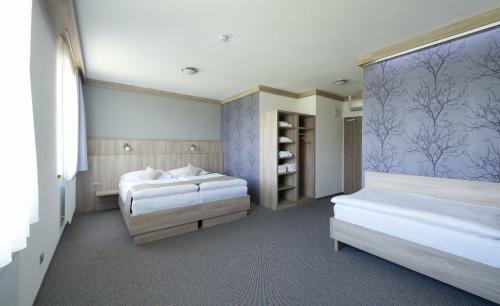 Hotel Wellness Penzion Medli?ky