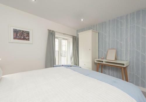 Apartamento The Broughton Mews Residence