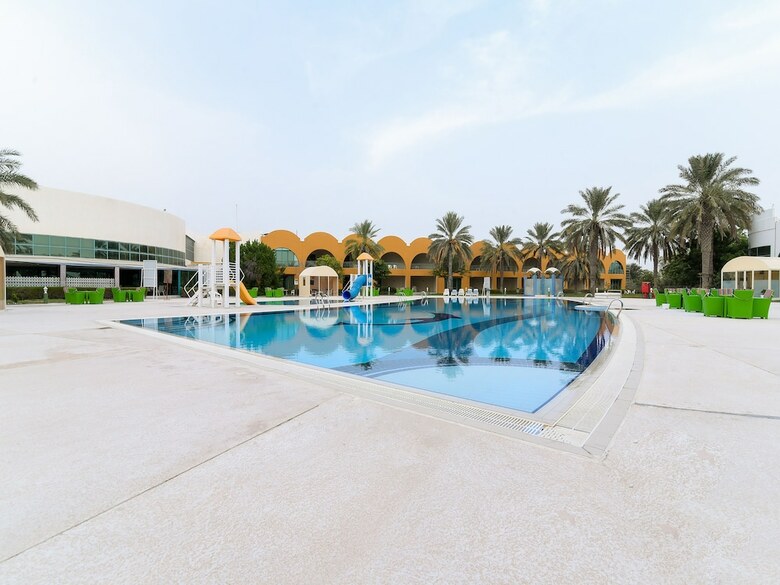Capital O 234 Tulip Inn Al Rahba