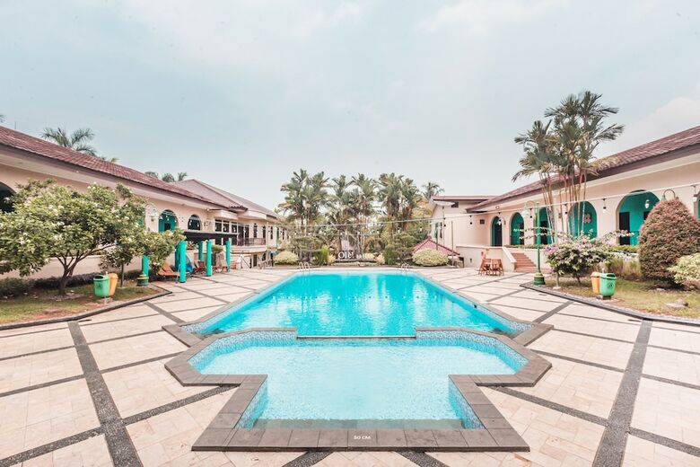 Capital O 1662 Ole Suites Hotel