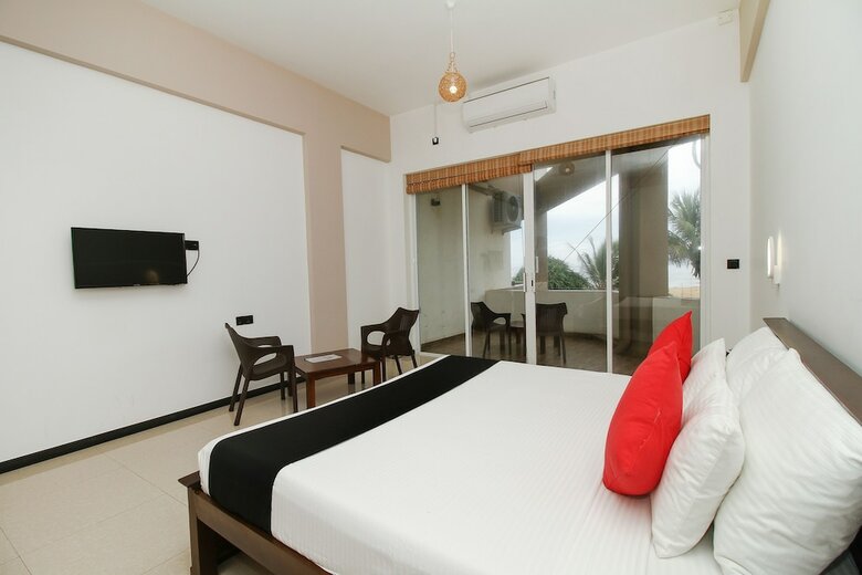 Hotel Capital O 311 Grace Beach Resort