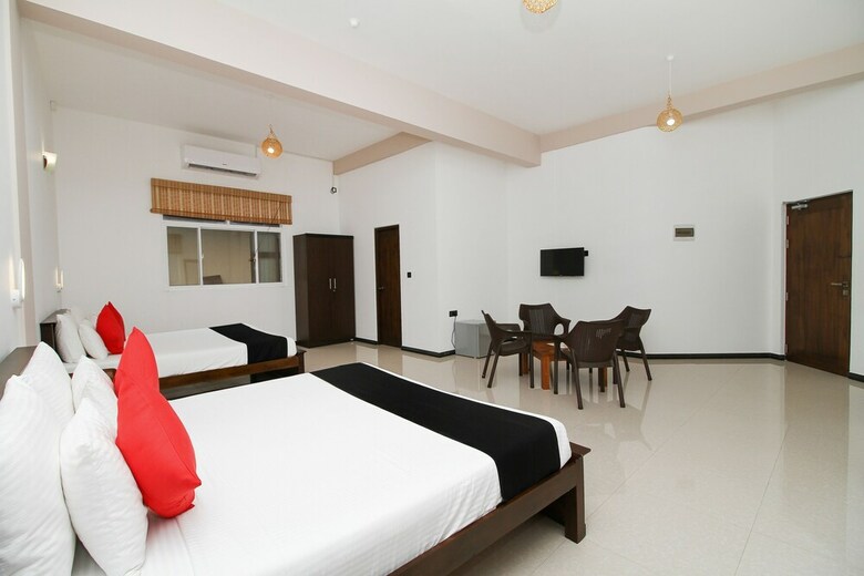 Hotel Capital O 311 Grace Beach Resort