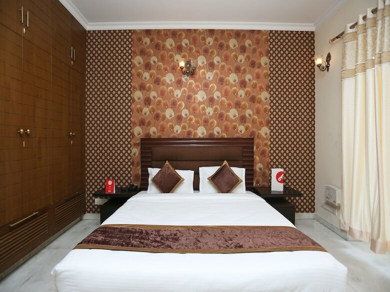 Hotel Oyo 15716 The Red Orchid