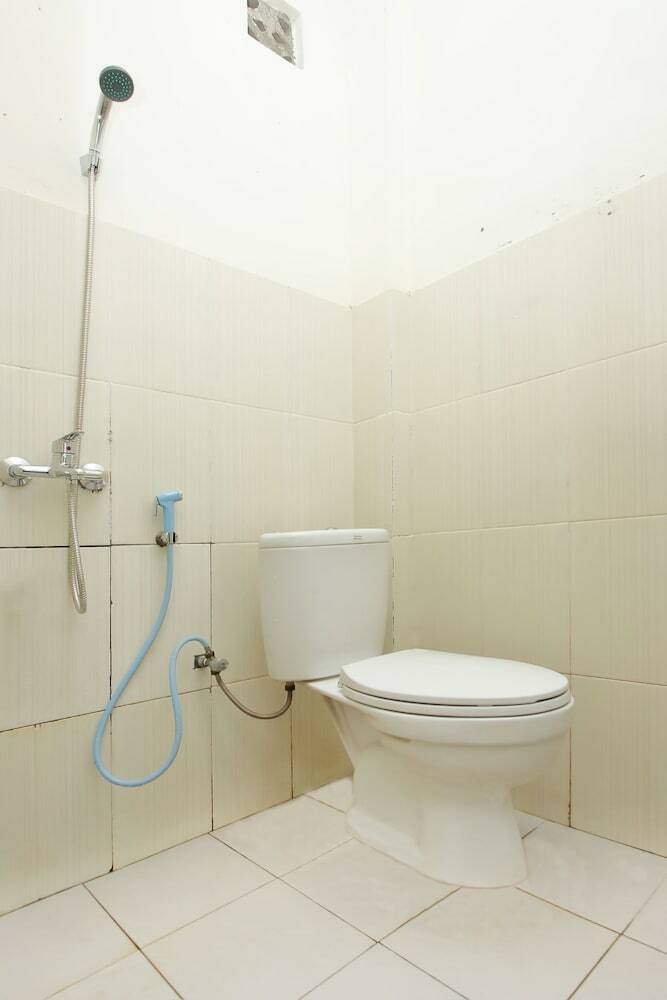 Hostal Oyo 933 Wisma Malawen