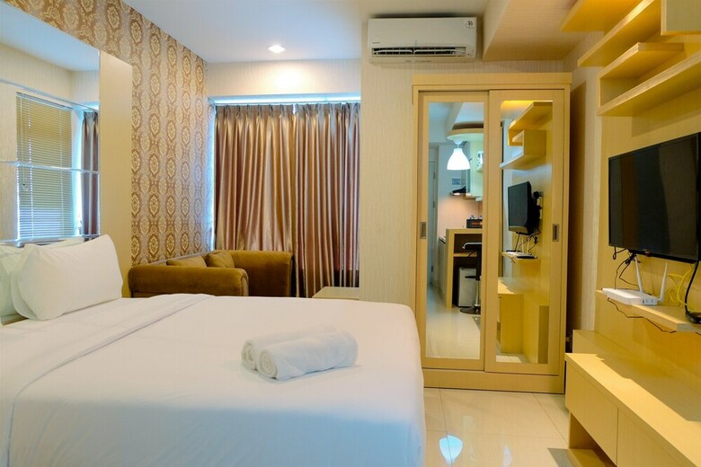 Homey Studio Apartment At Grand Kamala Lagoon