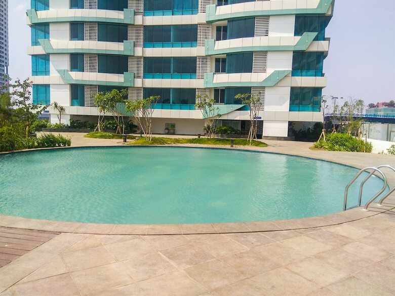 Homey Studio Apartment At Grand Kamala Lagoon